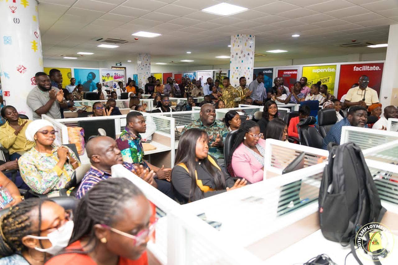 Chief Executive of YEA interacting with staff - Image 1