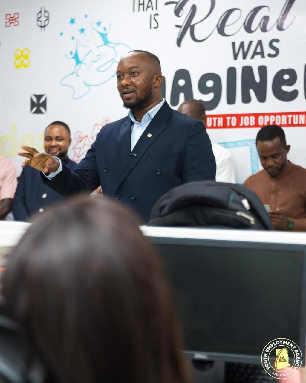 Chief Executive of YEA interacting with staff - Image 2