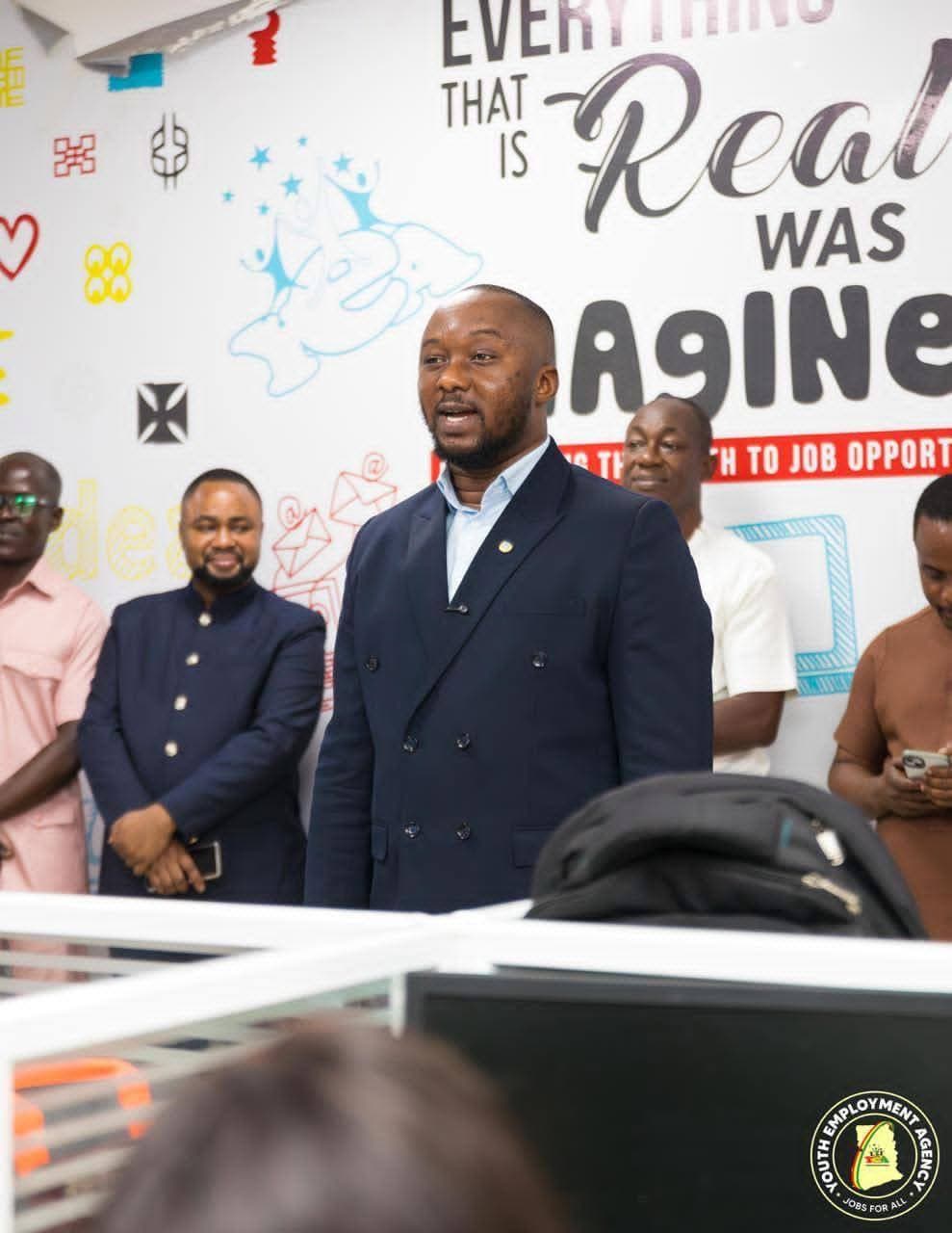 Chief Executive of YEA interacting with staff - Image 4